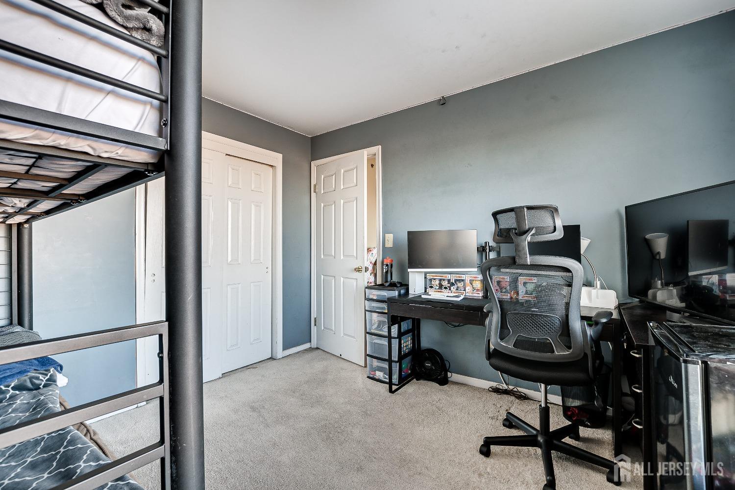 409 North Lafayette Road, Unit 409 Metuchen, NJ 08840 - Photo 21 of 24 a view of a workspace with furniture