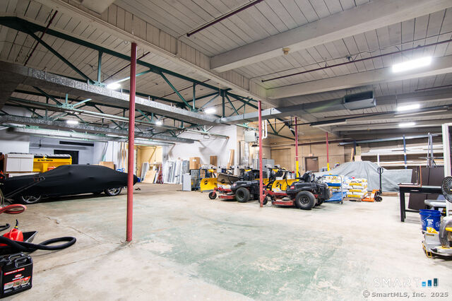 113 School Street Killingly, CT 06239 - Photo 30 of 33 a view of parking garage with cars