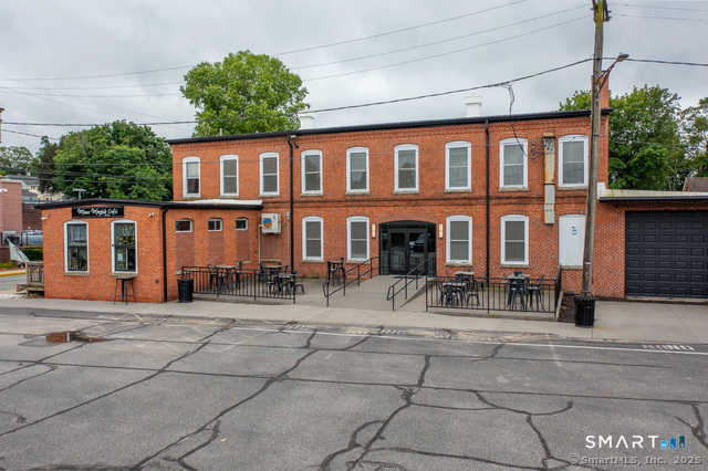 113 School Street Killingly, CT 06239 - Photo 3 of 33 a view of a building with sitting area