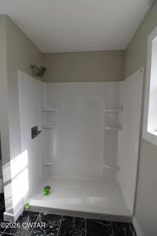 a bathroom with a bathtub