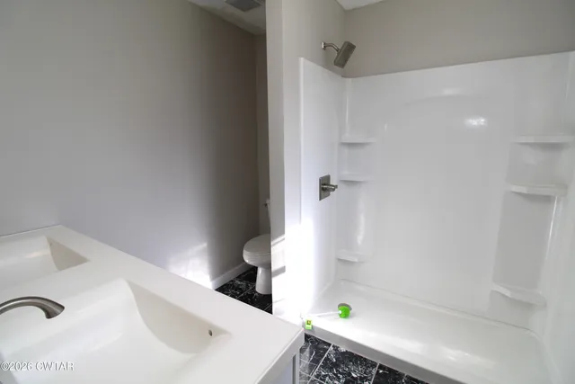 a bathroom with a sink and a bathtub