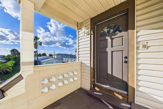 a view of a porch with a backyard