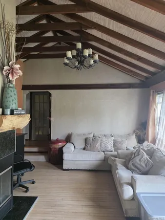 a living room with furniture and a table