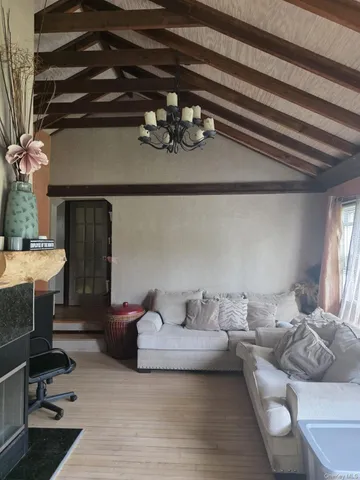 a living room with furniture and a table