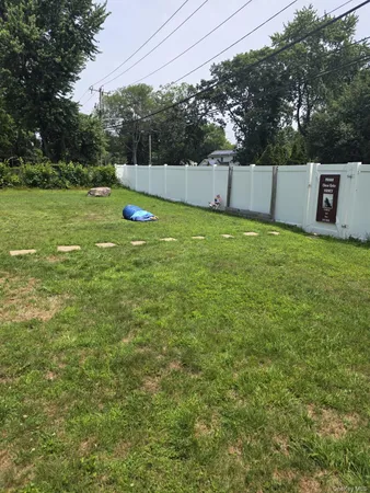 a view of a backyard with a small pool