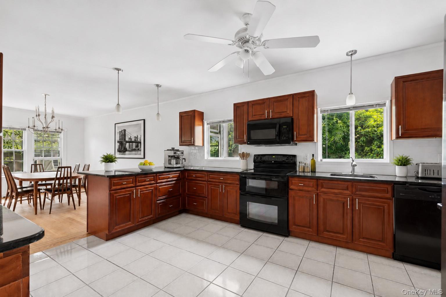 17 Old Orchard Road New Rochelle, NY 10804 - Photo 6 of 32 a large kitchen with cabinets and furniture