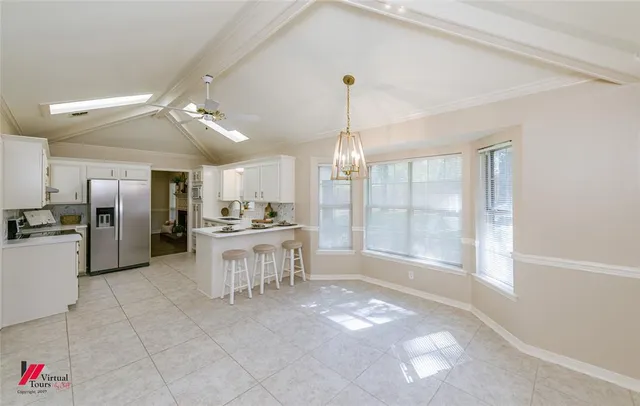 a view of cabinets a sink and dishwasher in a kitchen