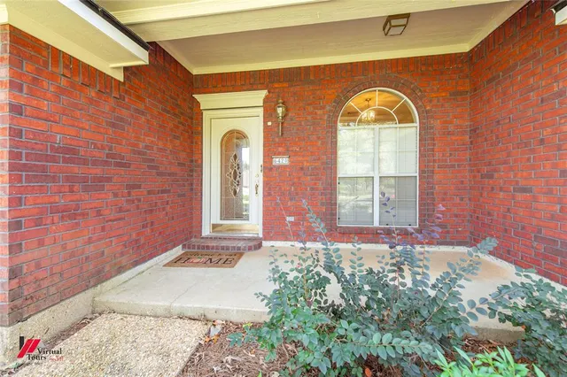 a front view of a house with a door