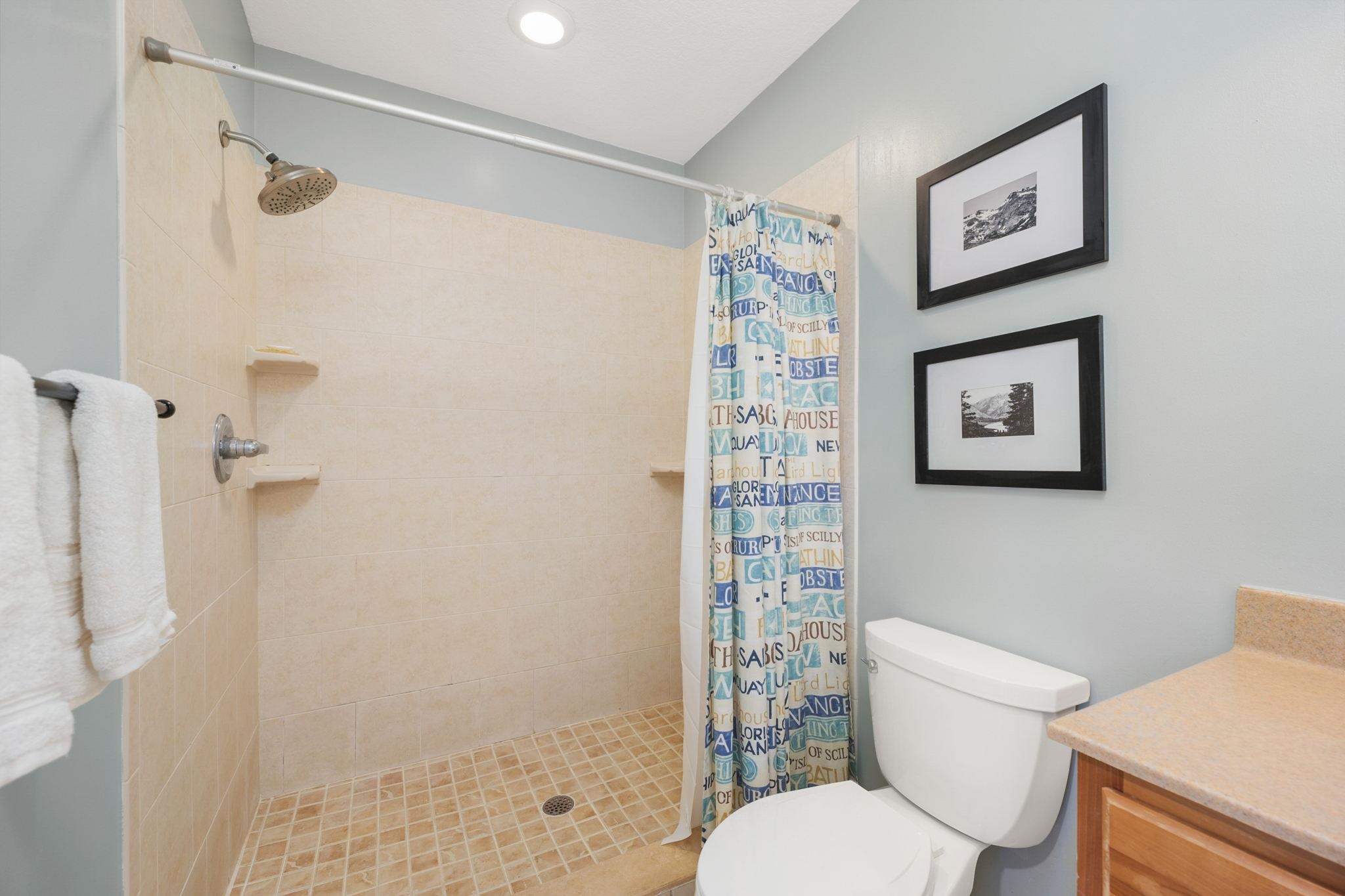 235 Shamrock Road St. Augustine, FL 32086 - Photo 20 of 28 a white toilet sitting next to a bathroom