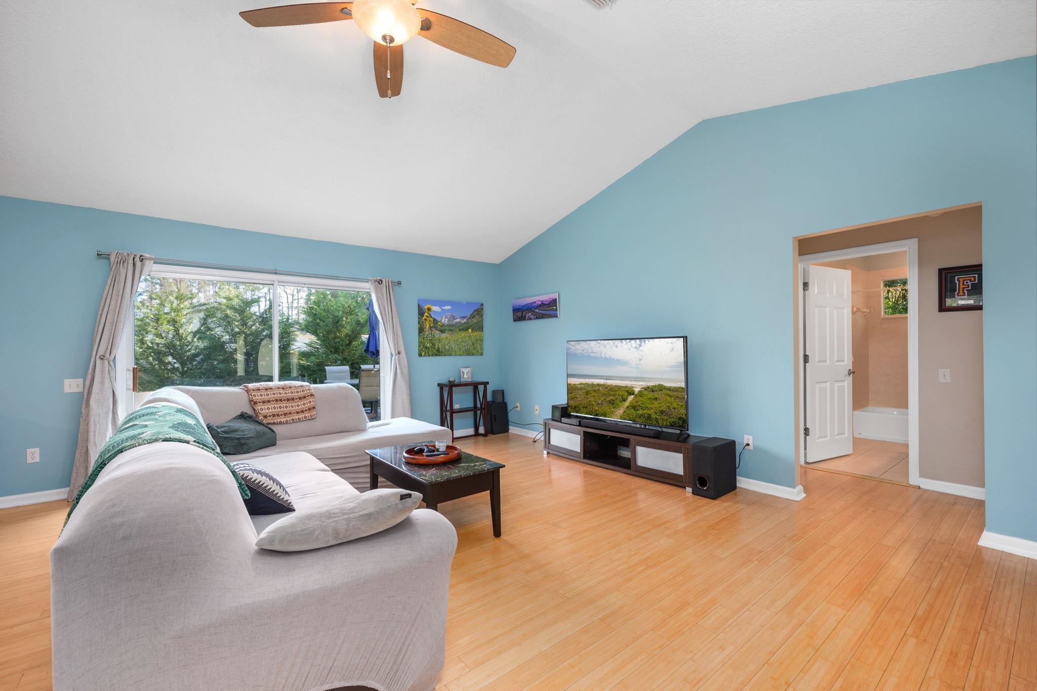 235 Shamrock Road St. Augustine, FL 32086 - Photo 7 of 28 a living room with furniture and a large window