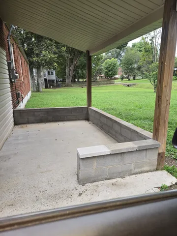 a view of backyard with green space