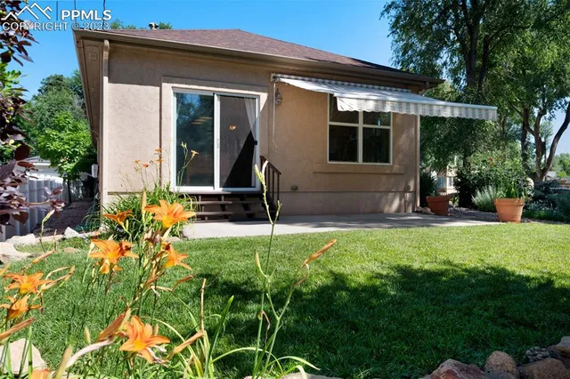 a house view with a garden space
