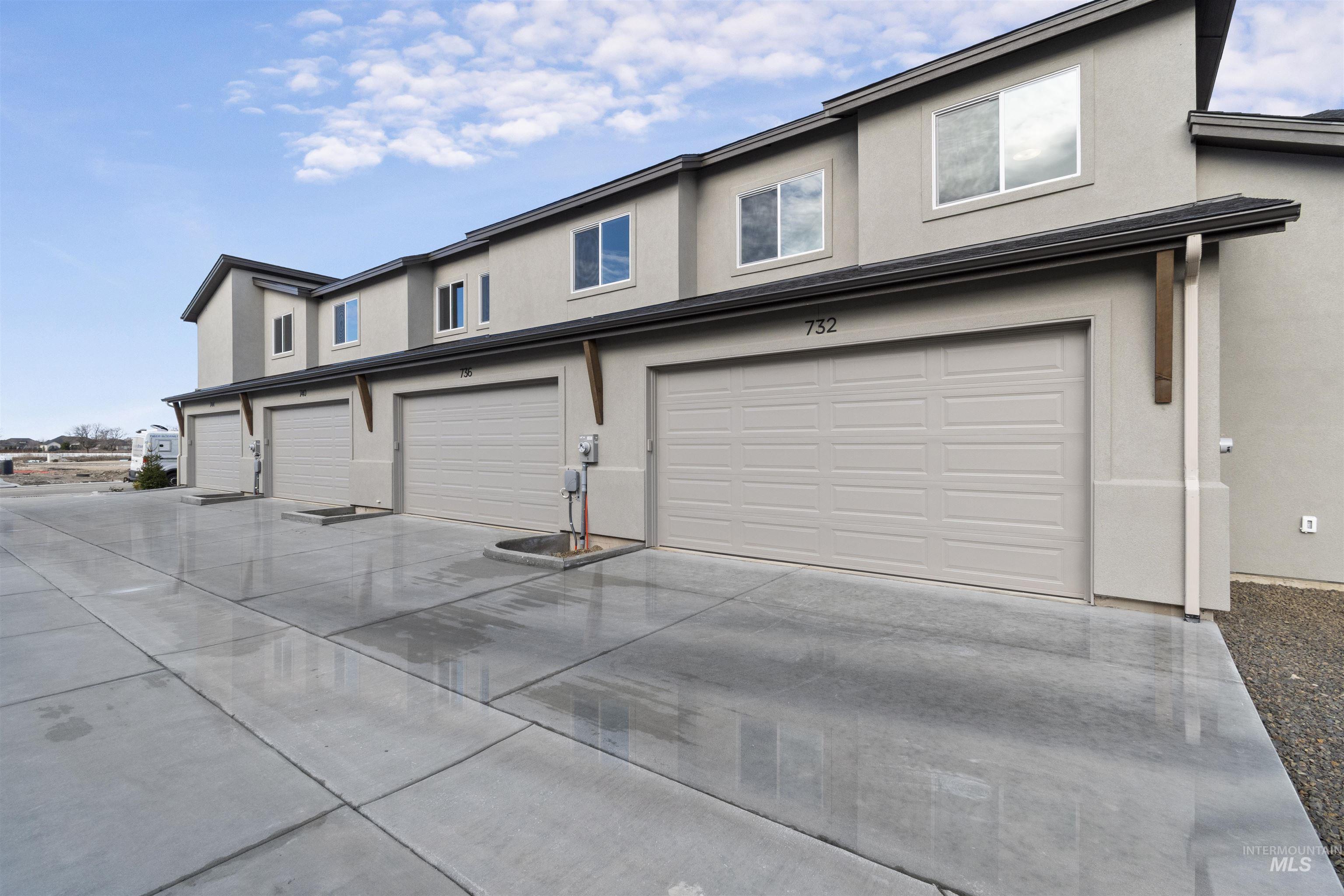 764 South Calhoun Lane Star, ID 83669 - Photo 2 of 48 Traditional-style home featuring stucco siding, concrete driveway, and a garage