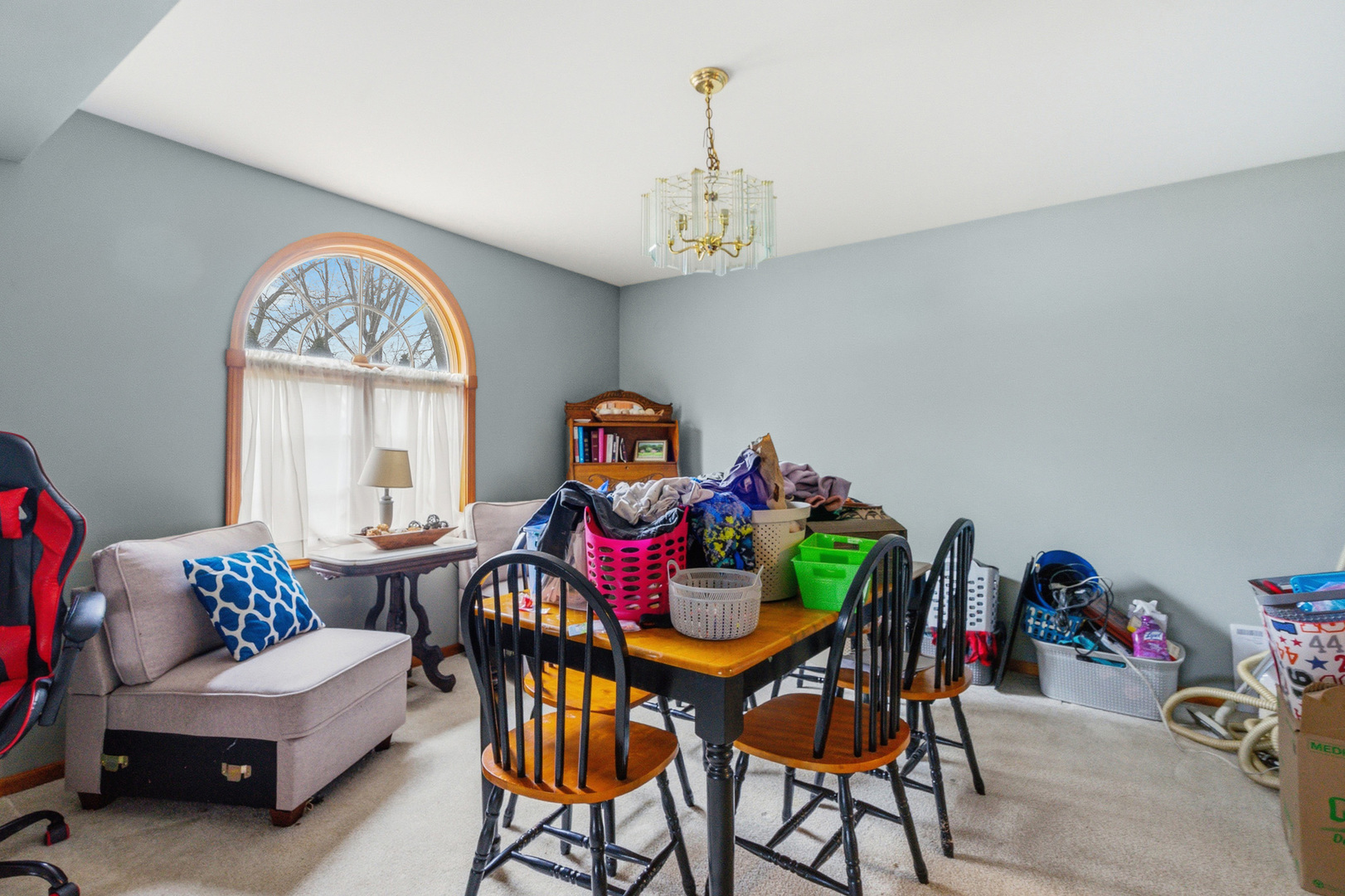 621 Huntley Terrace Crete, IL 60417 - Photo 5 of 31 a view of a dining room with furniture a chandelier and a window