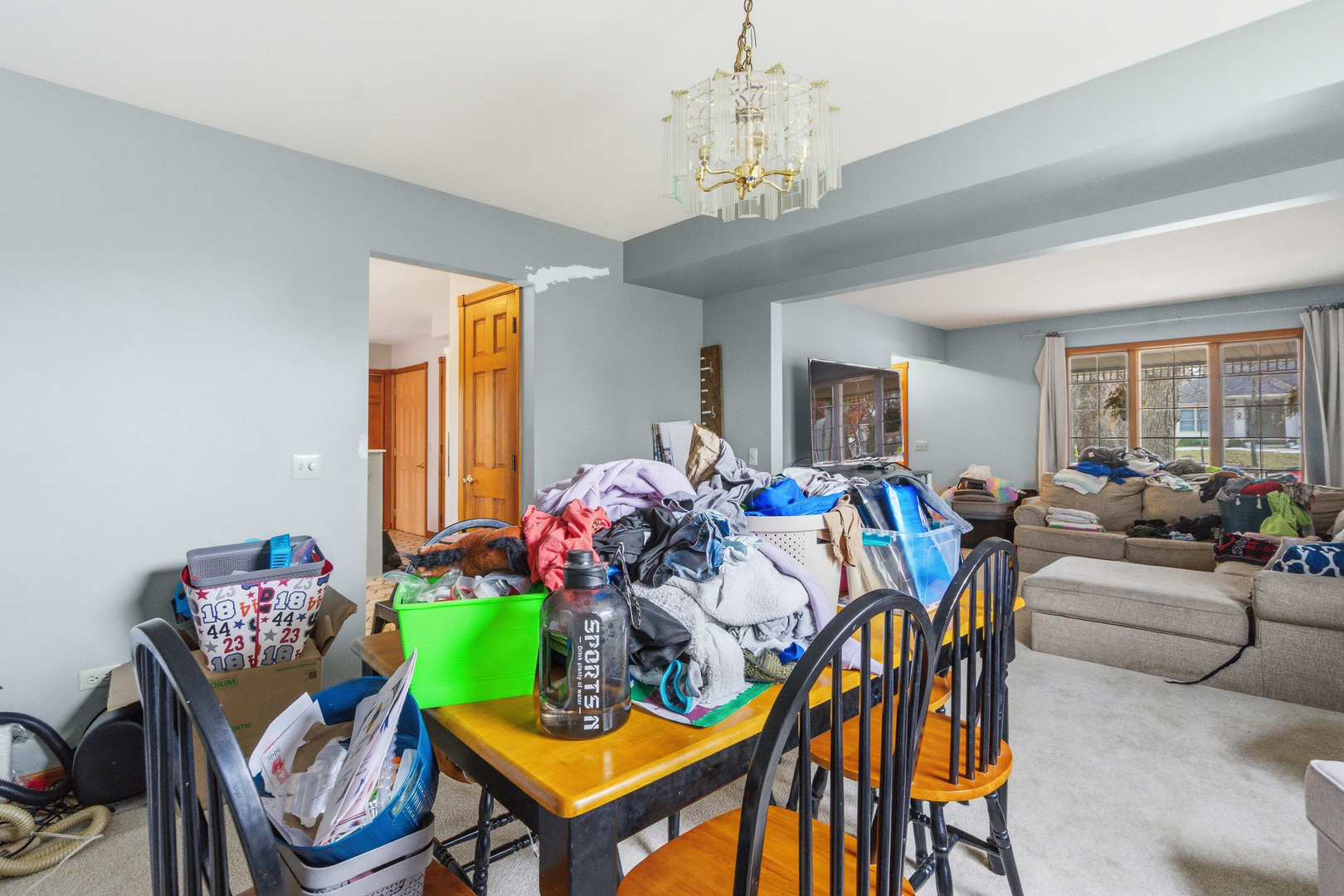 621 Huntley Terrace Crete, IL 60417 - Photo 6 of 31 a outdoor dining room with furniture a chandelier and window