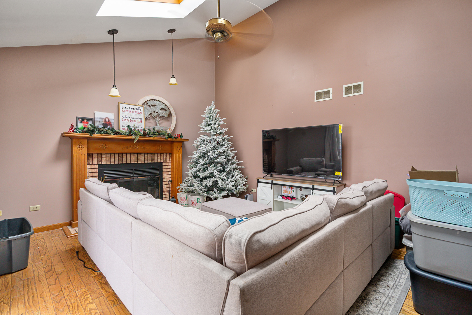 621 Huntley Terrace Crete, IL 60417 - Photo 8 of 31 a living room with furniture and a flat screen tv