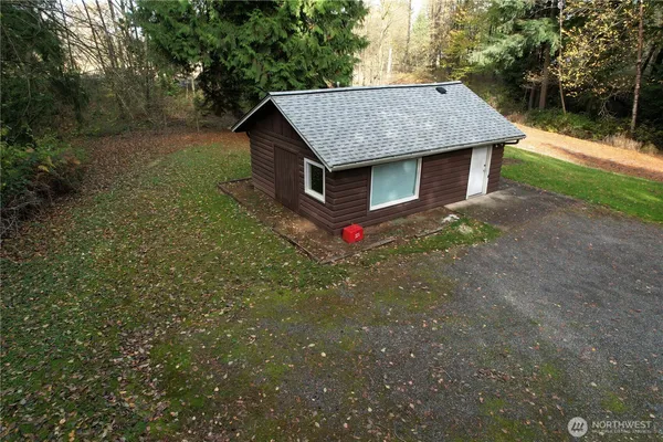 a house with trees in front of it