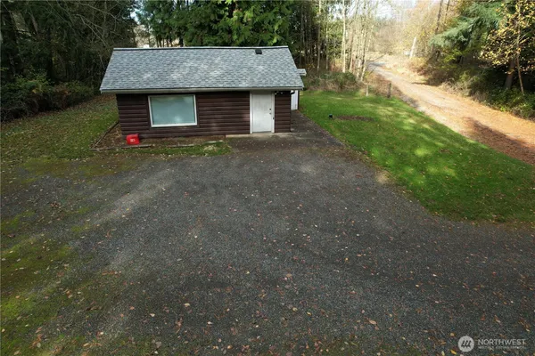 a front view of a house with yard