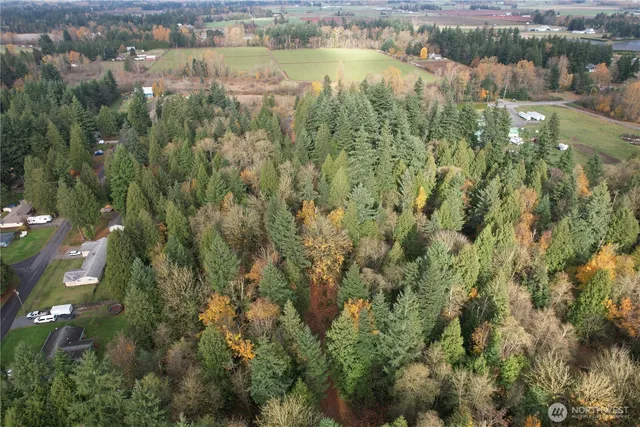 a view of lake with green space