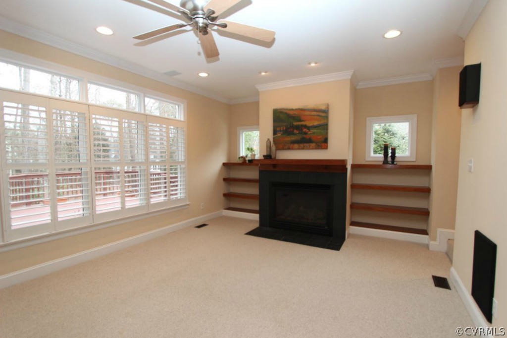 10224 Sioux Road Richmond, VA 23235 - Photo 10 of 24 a living room with furniture and a large window