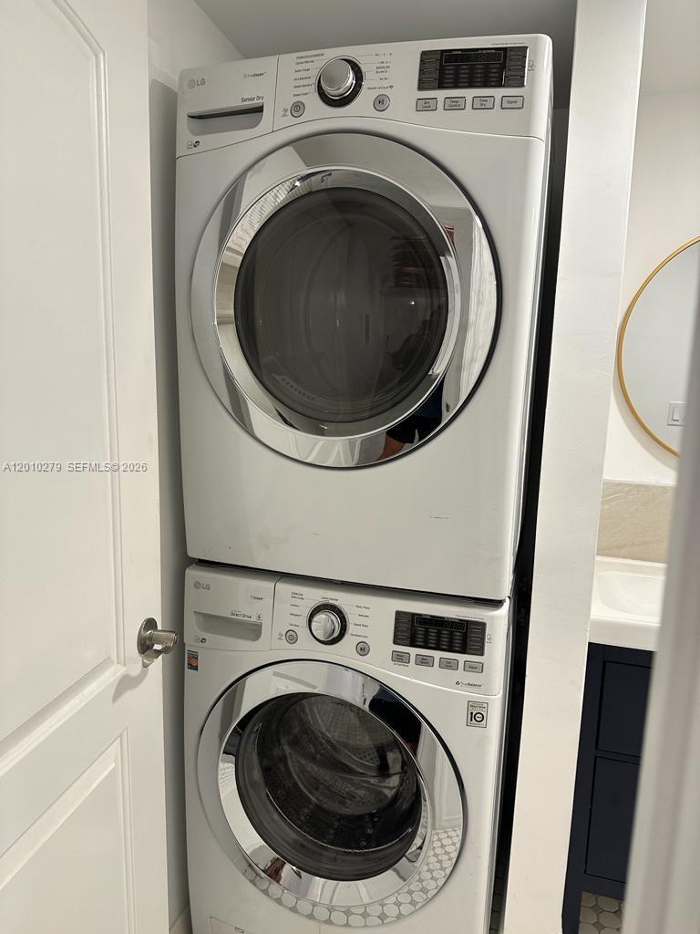 3113 Southwest 14th Street, Unit A Miami, FL 33145 - Photo 12 of 12 a utility room with dryer and washer