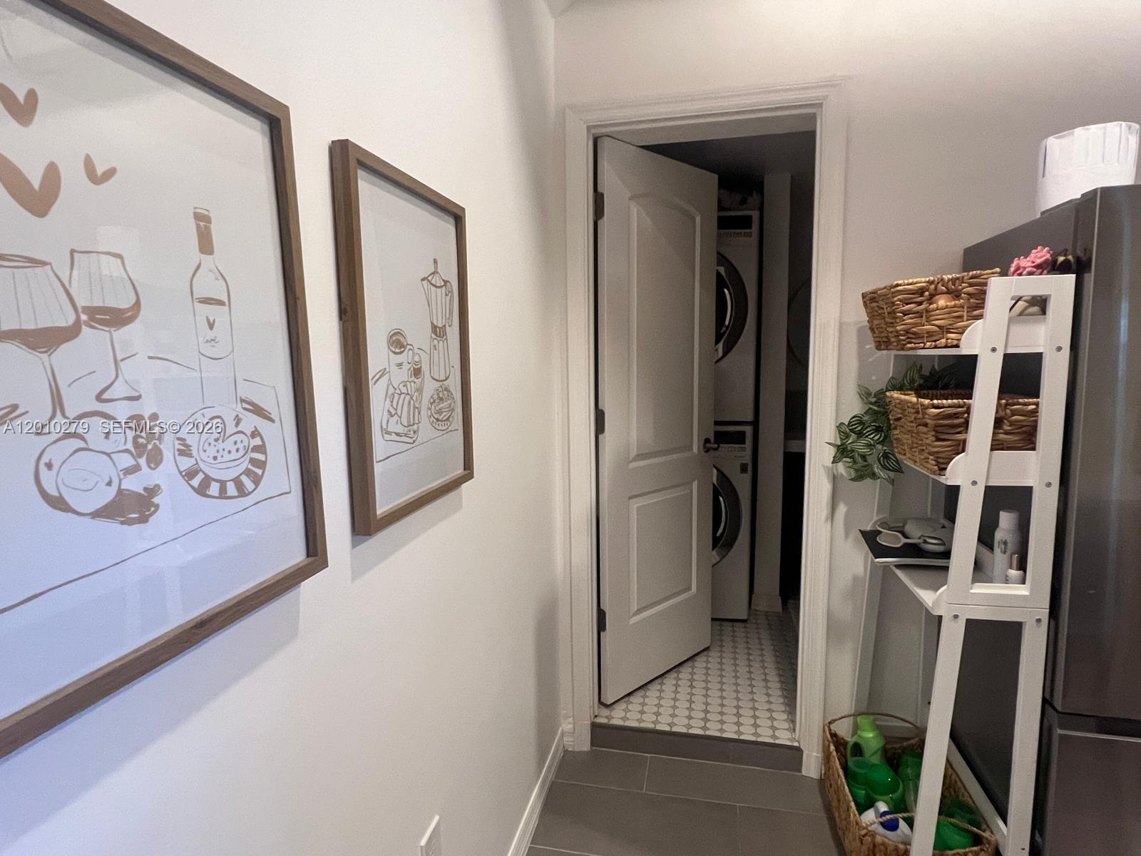 3113 Southwest 14th Street, Unit A Miami, FL 33145 - Photo 10 of 12 a view of a hallway with shelves