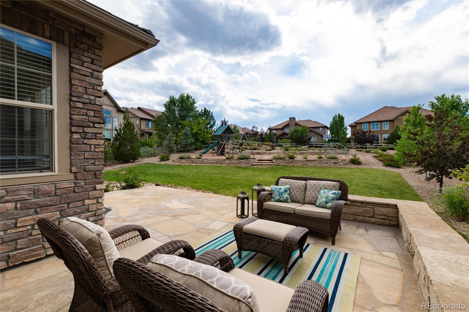 10703 Braesheather Court Highlands Ranch, CO 80126 - Photo 40 of 48 a view of outdoor space yard and patio