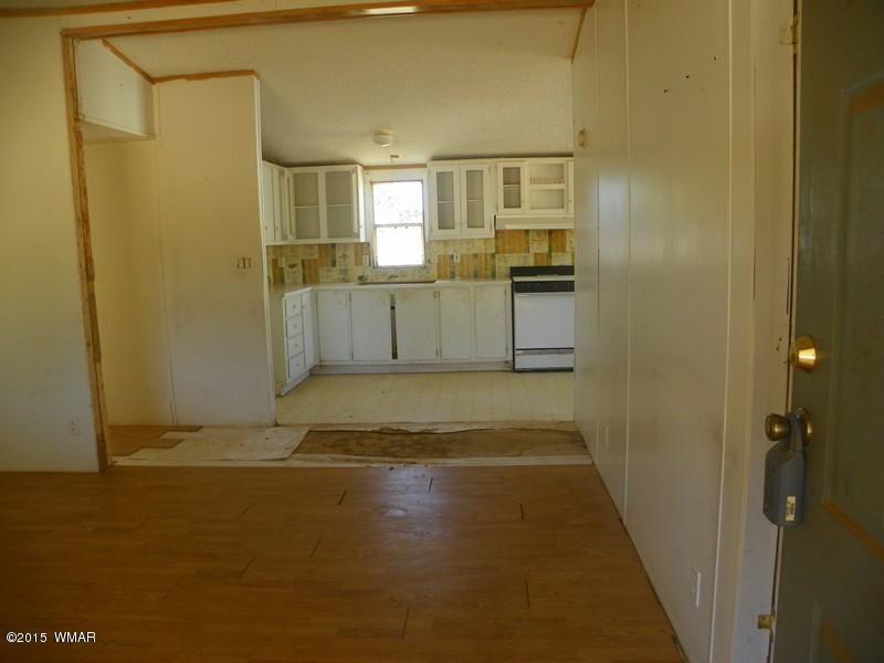 4452 East Pinto Road Snowflake, AZ 85937 - Photo 2 of 21 a view of a kitchen from the hallway