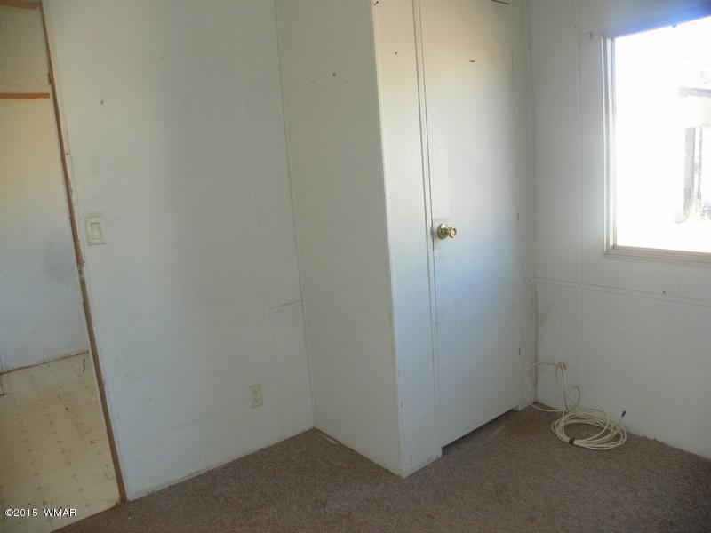 4452 East Pinto Road Snowflake, AZ 85937 - Photo 6 of 21 an empty room with windows