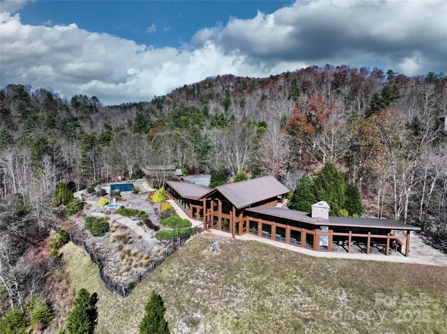 a view of a patio with iron fence