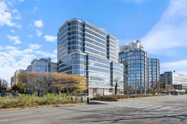 a tall building sitting on the side of a street