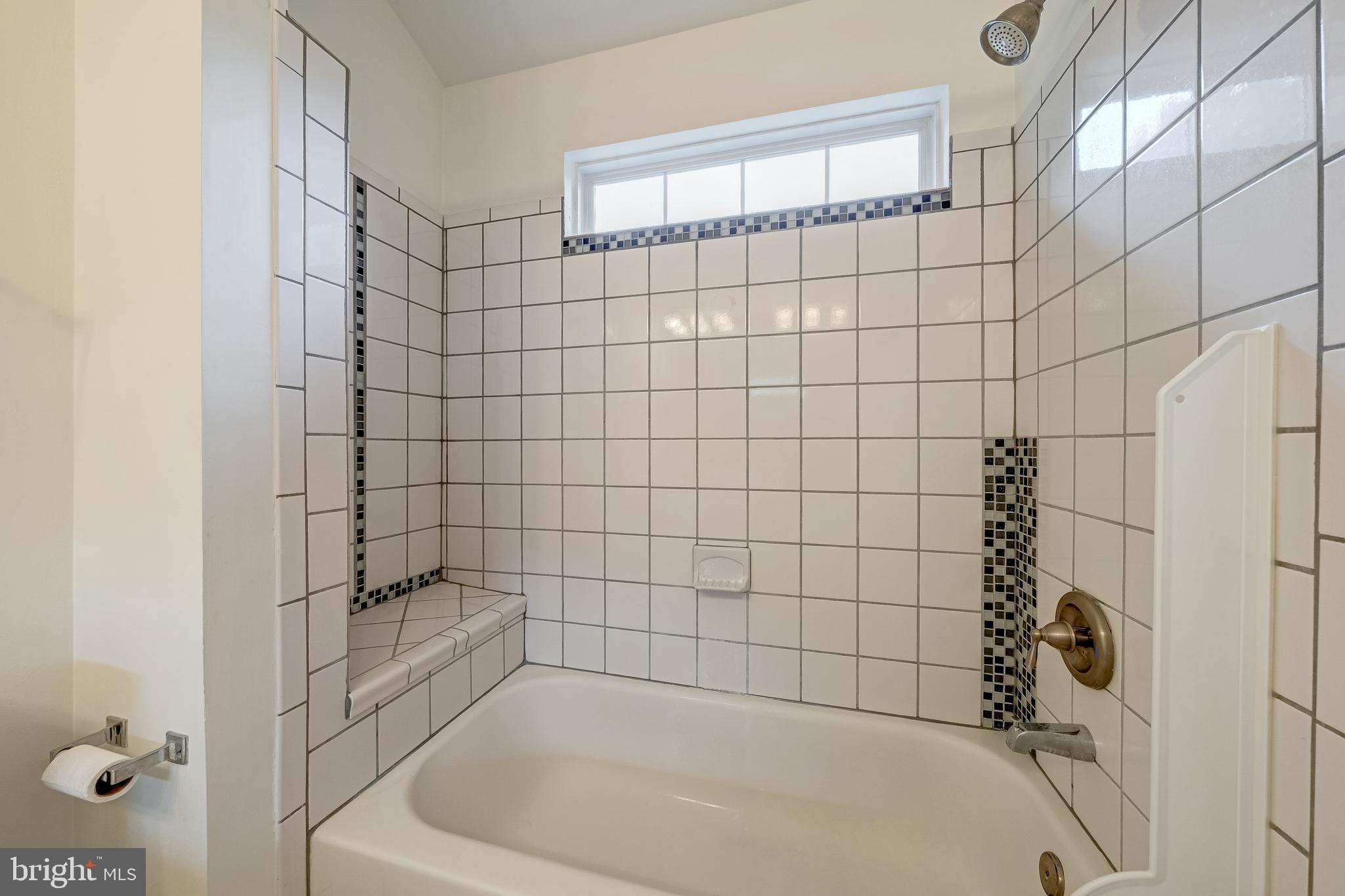 11444 Heritage Commons Way Reston, VA 20194 - Photo 19 of 35 a bathroom with a bathtub