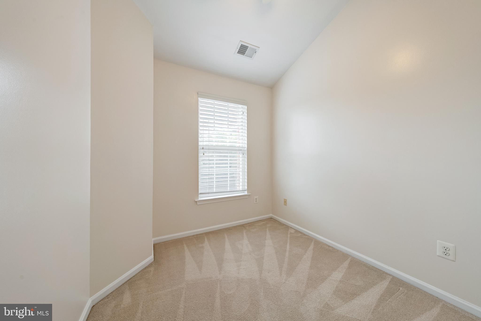 11444 Heritage Commons Way Reston, VA 20194 - Photo 23 of 35 a view of a room with a window