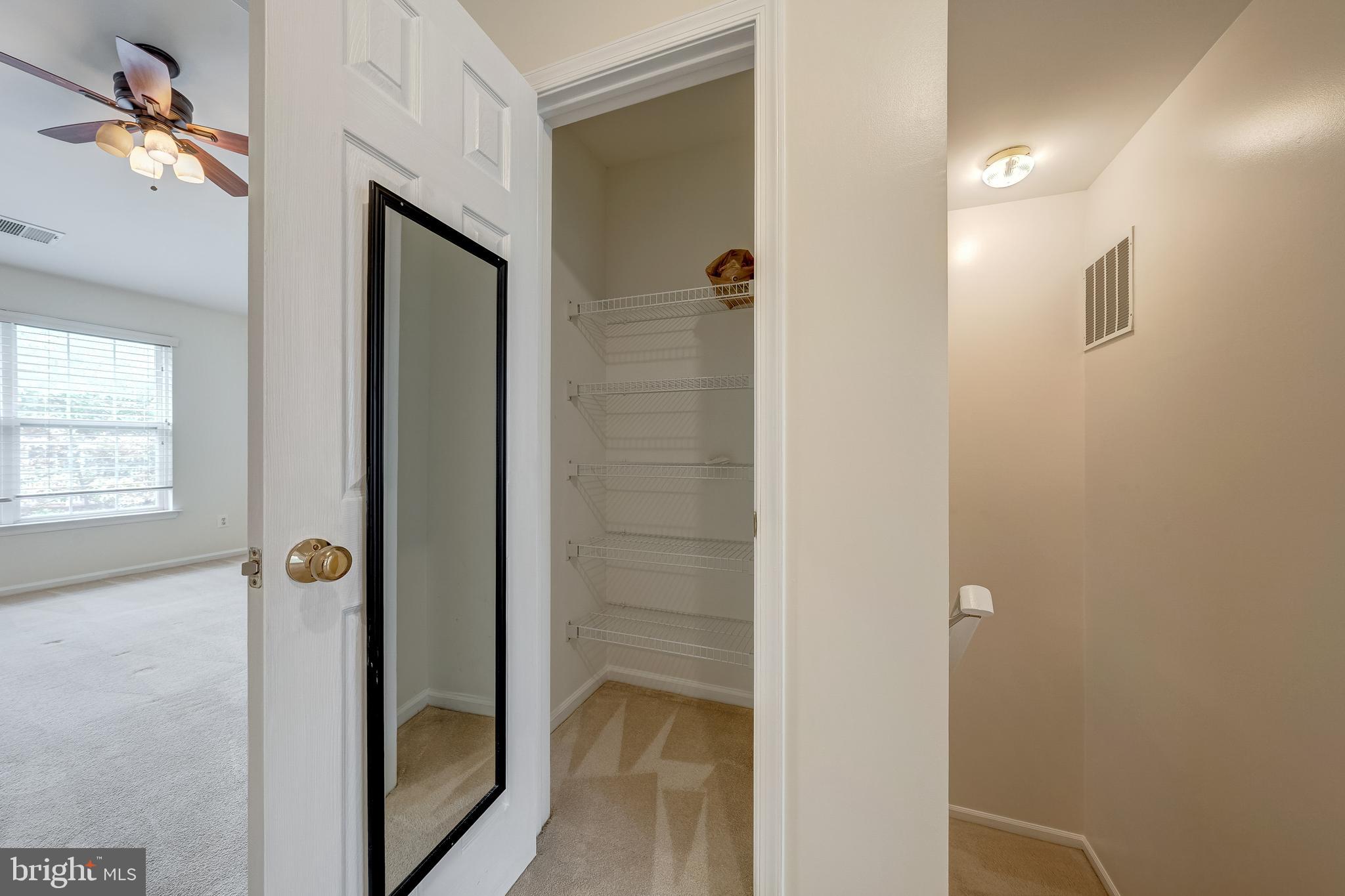 11444 Heritage Commons Way Reston, VA 20194 - Photo 26 of 35 a bathroom with a mirror