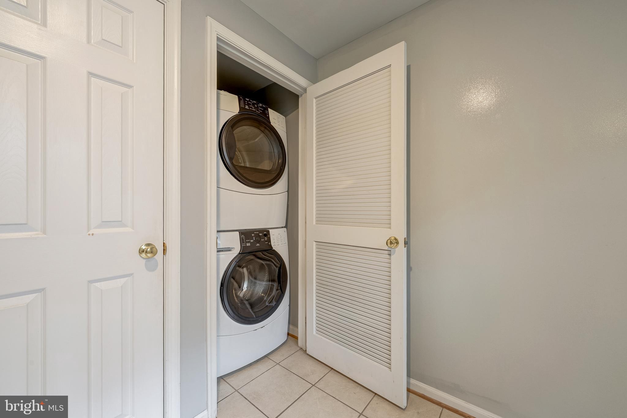 11444 Heritage Commons Way Reston, VA 20194 - Photo 32 of 35 a utility room with dryer and washer