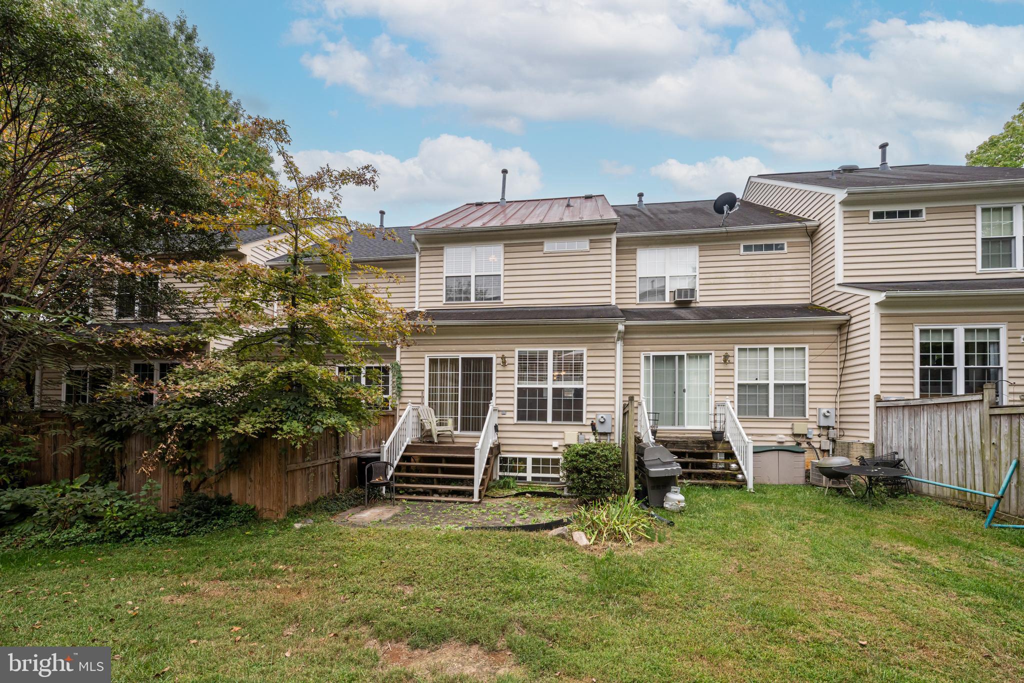 11444 Heritage Commons Way Reston, VA 20194 - Photo 35 of 35 a view of a house with a yard and sitting area
