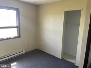 Bright and airy room with closet space.