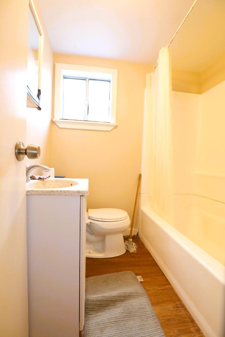 2855 Senter Road, Unit 10 San Jose, CA 95111 - Photo 13 of 15 a bathroom with a toilet a sink and mirror