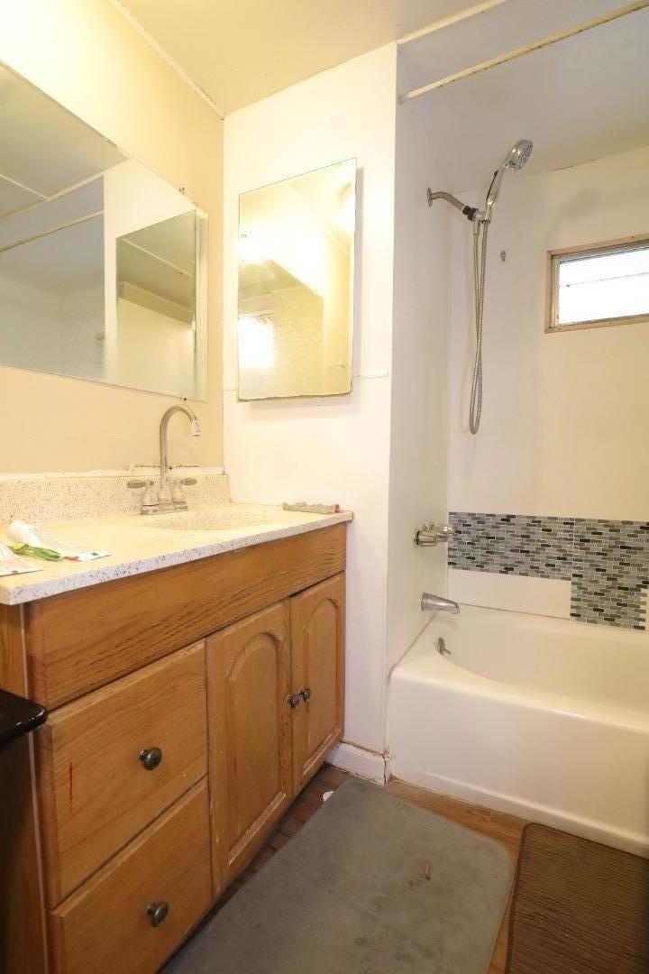 2855 Senter Road, Unit 10 San Jose, CA 95111 - Photo 15 of 15 a bathroom with a tub sink and mirror