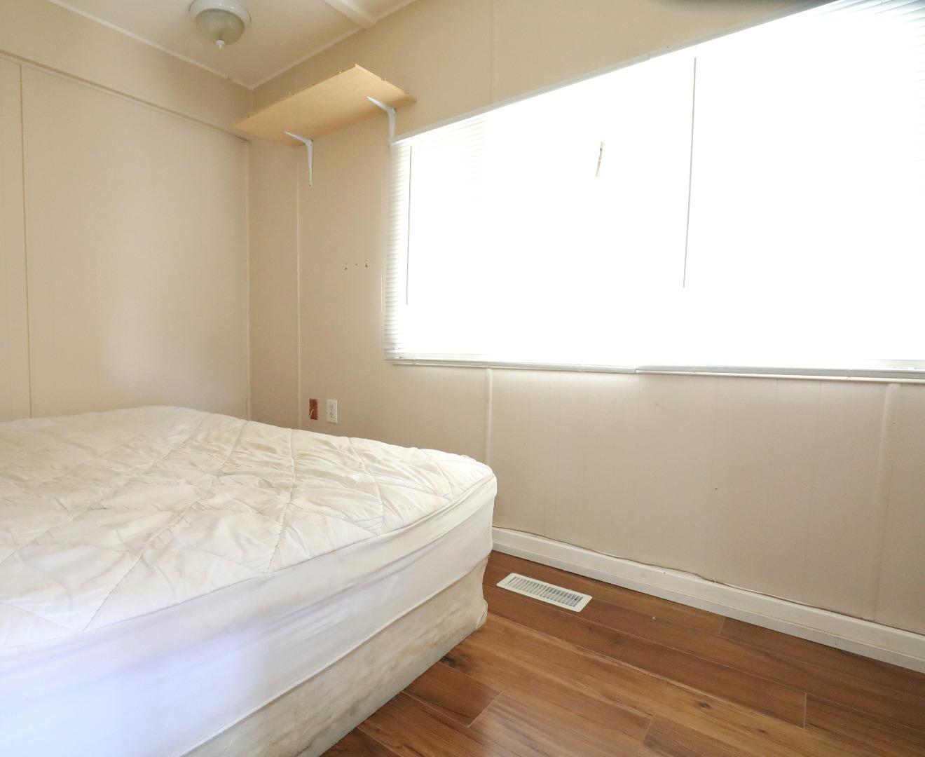 2855 Senter Road, Unit 10 San Jose, CA 95111 - Photo 6 of 15 a room with a bed and a window