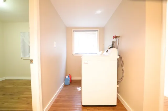a view of a room with utility room and empty racks