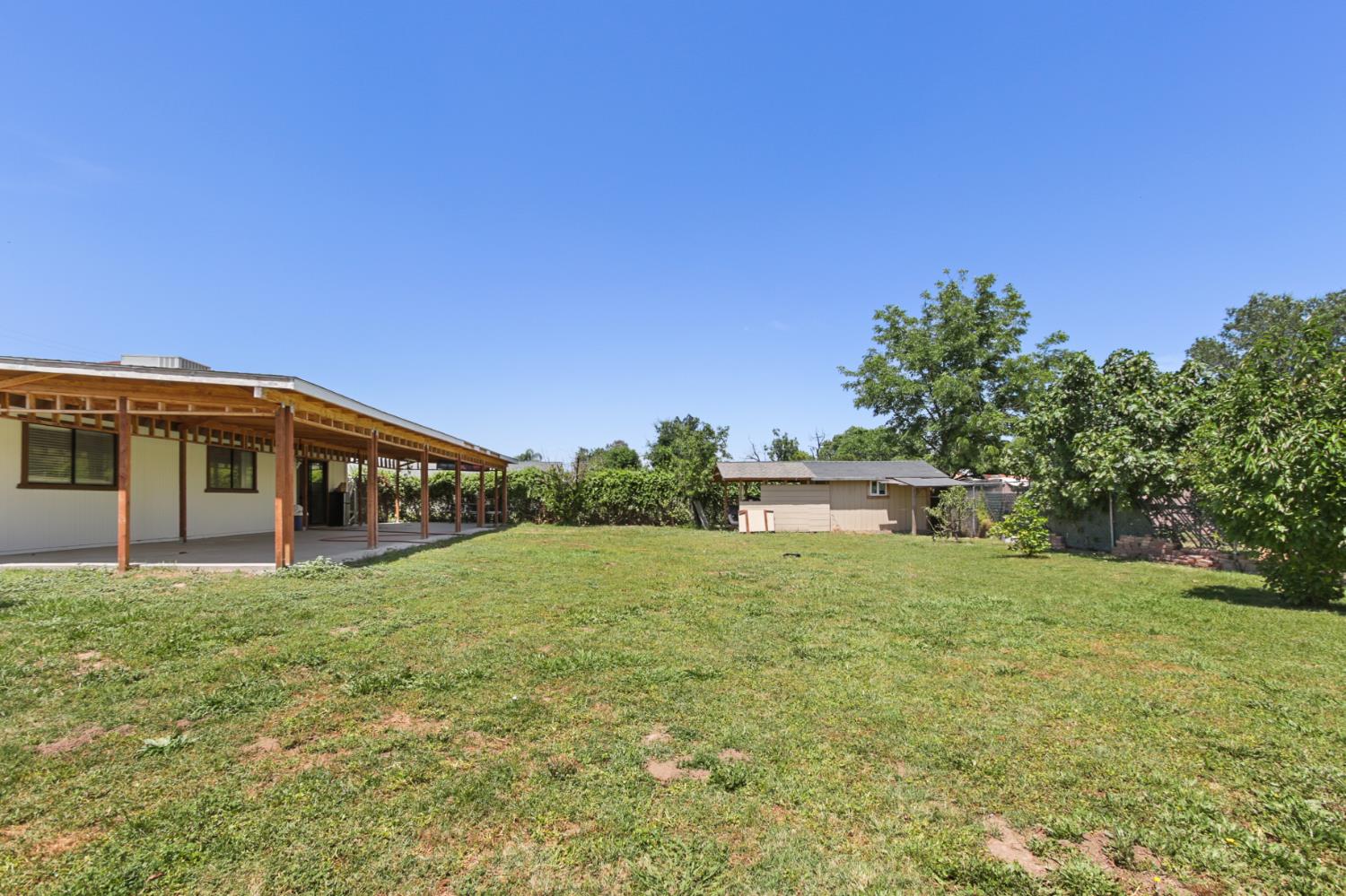 7208 7th Street Rio Linda, CA 95673 - Photo 33 of 41 a front view of a house with a yard