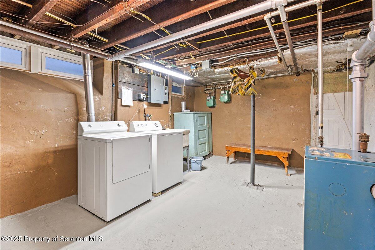 1446 Thackery Street Scranton, PA 18504 - Photo 25 of 25 a utility room with dryer and washer