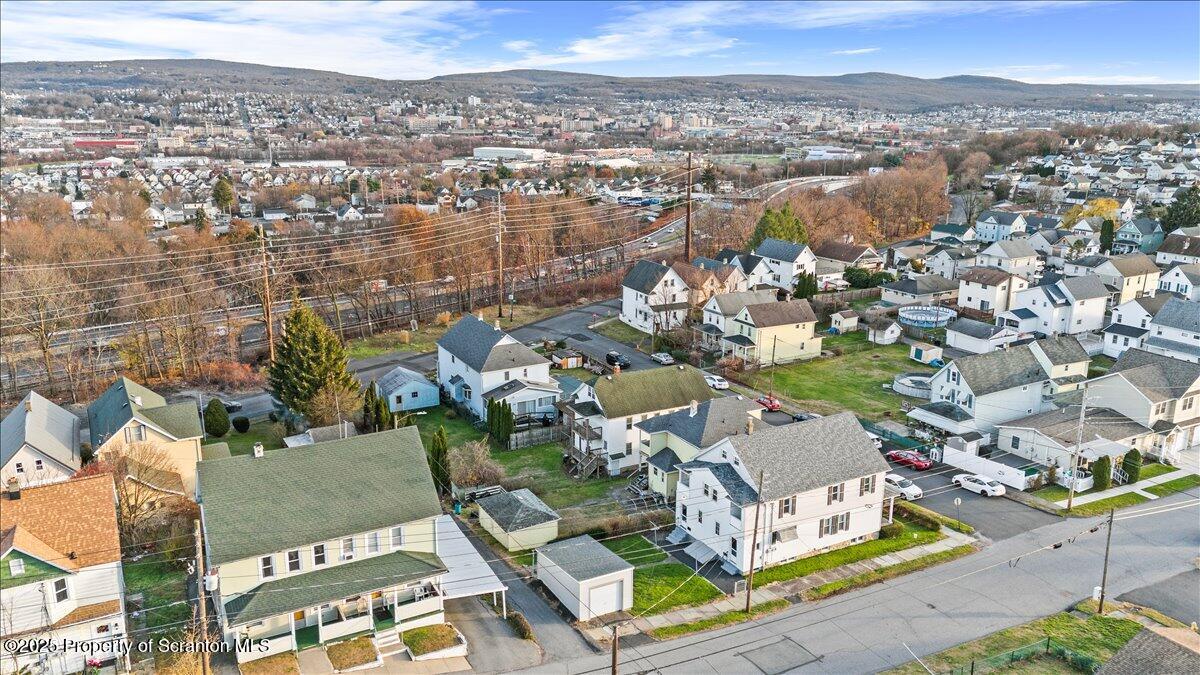 1446 Thackery Street Scranton, PA 18504 - Photo 7 of 25 an aerial view of residential building with parking
