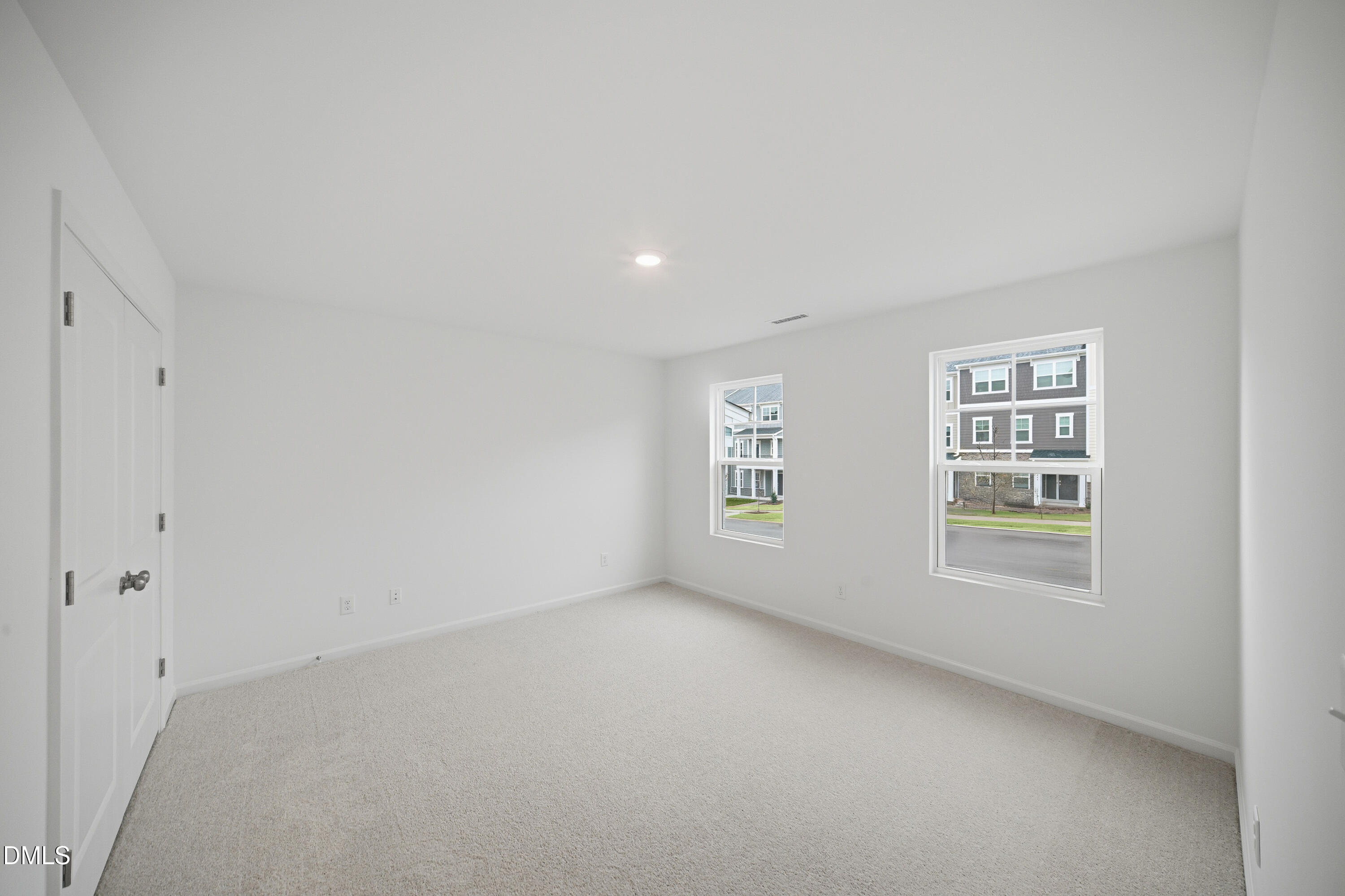 1445 Jay Road Knightdale, NC 27545 - Photo 20 of 58 a view of an empty room with a window