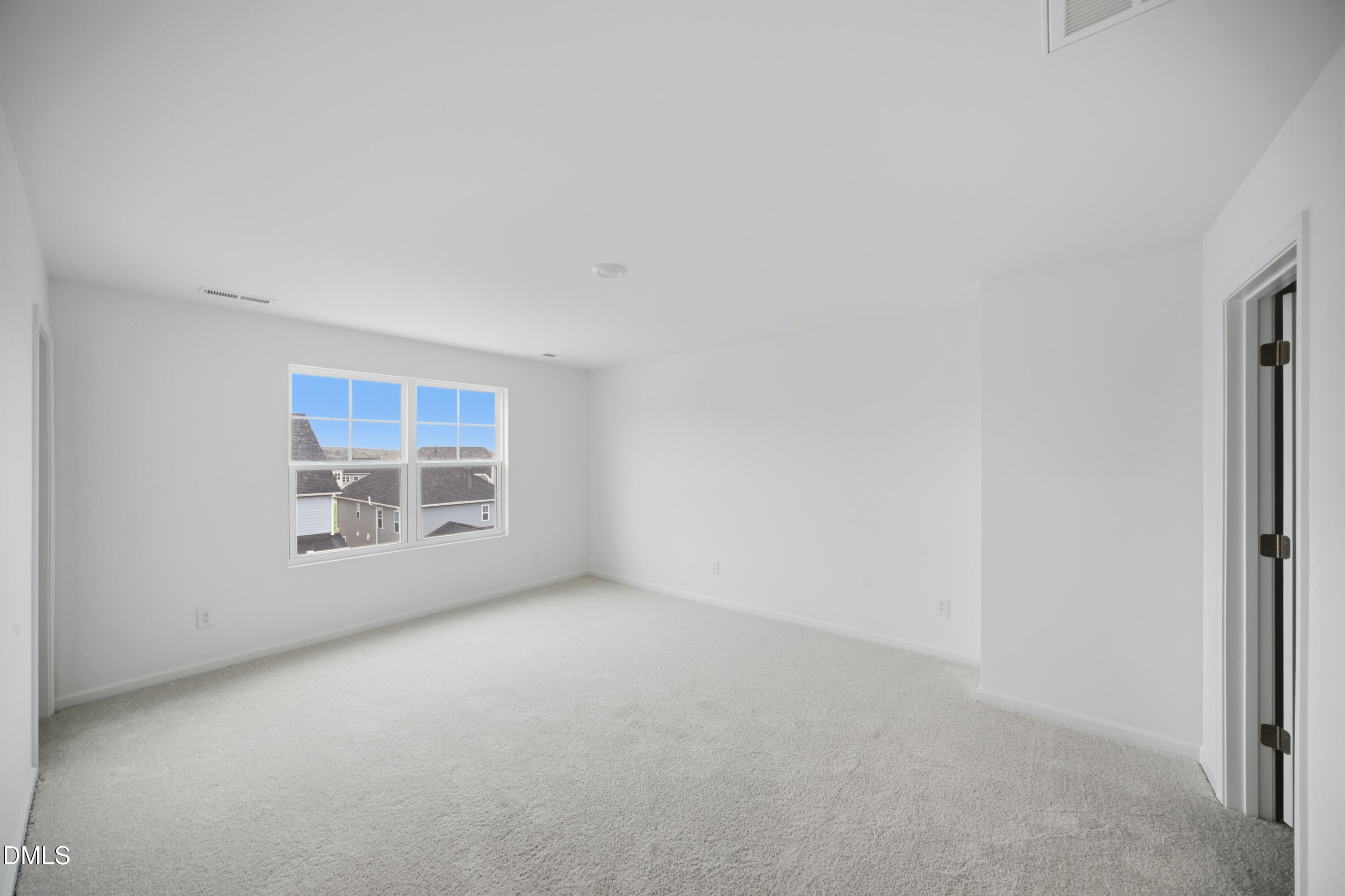 1445 Jay Road Knightdale, NC 27545 - Photo 27 of 58 a view of an empty room with a window