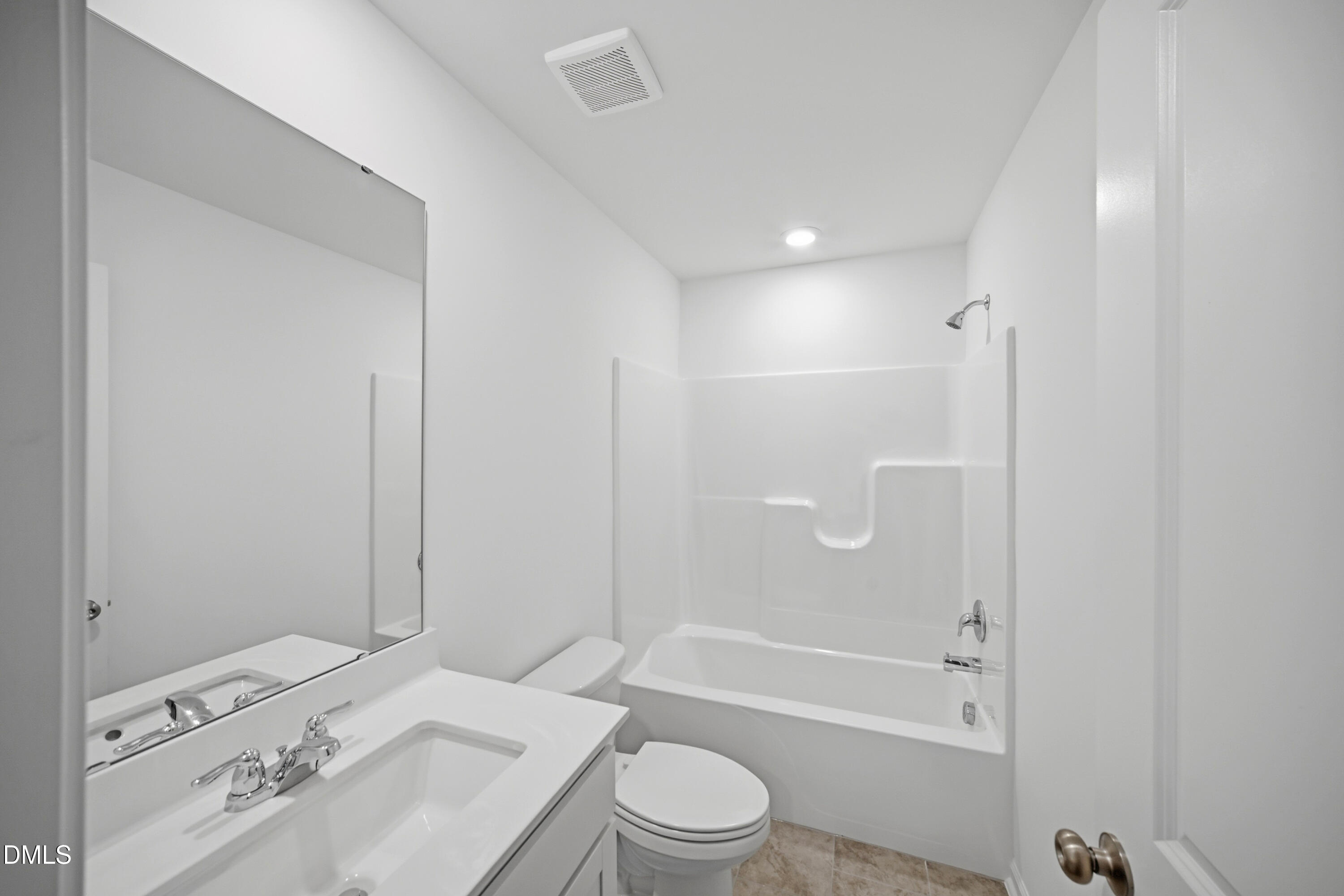 1445 Jay Road Knightdale, NC 27545 - Photo 29 of 58 a bathroom with a sink a toilet and shower