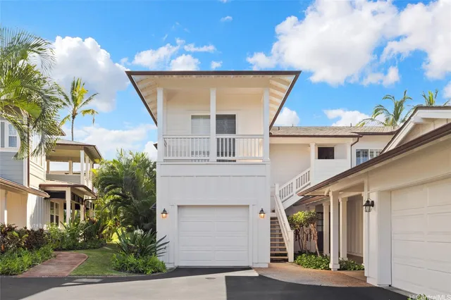 front view of a house with a street
