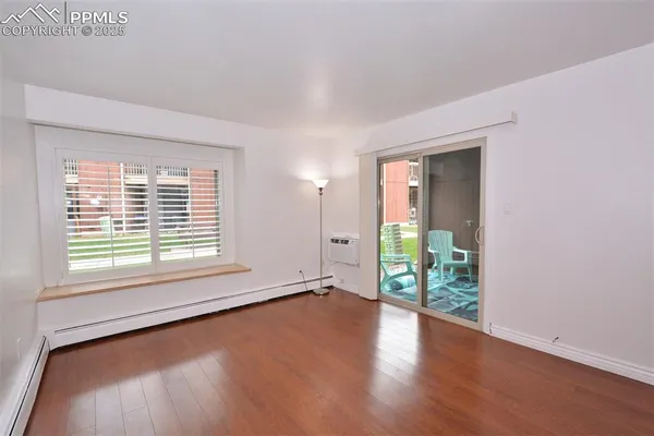 a view of a room with a large window