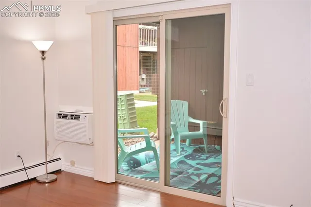 a view of a bathroom with a sink and a mirror